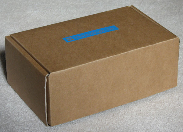 Small brown box, big silver heatsink.